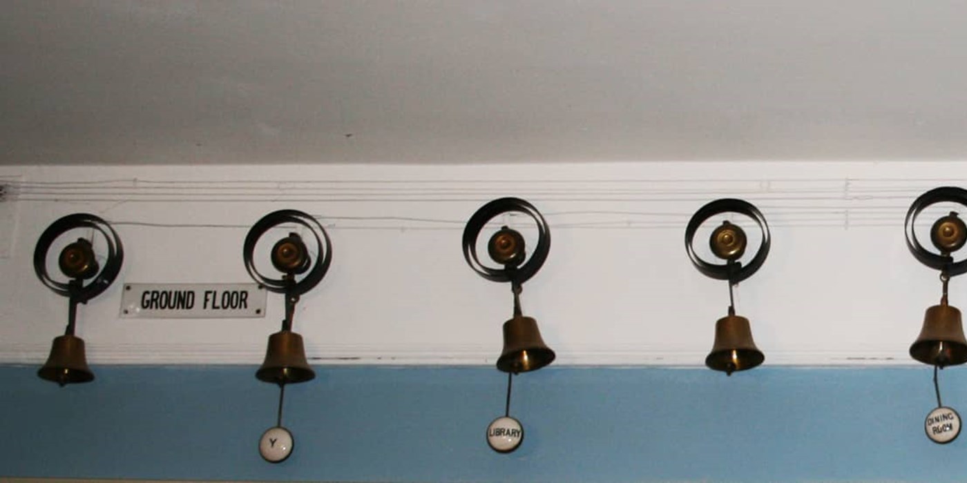 eight bells on a wall as part of country house
