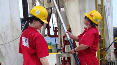 Sally Morgan and Louise Anderson preparing downhole logging tools for use on IODP Expedition 325