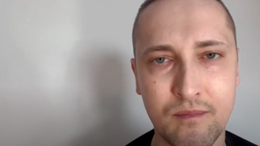 video still of man, Kamil Sterniczuk, as he discusses the patient and carer group