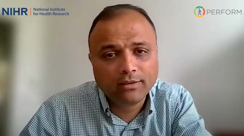 Dr Bhautesh Jani talking to camera