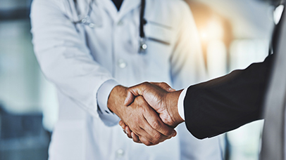 two men shaking hands