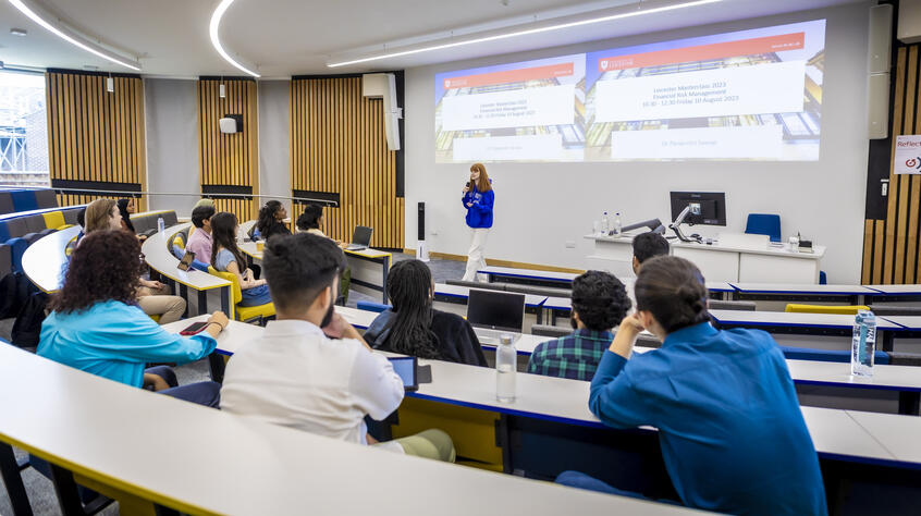 Lecture theatre with a lecture taking place in Brookfield House, University of Leicester