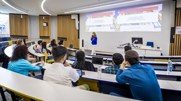 Lecture theatre with a lecture taking place in Brookfield House, University of Leicester