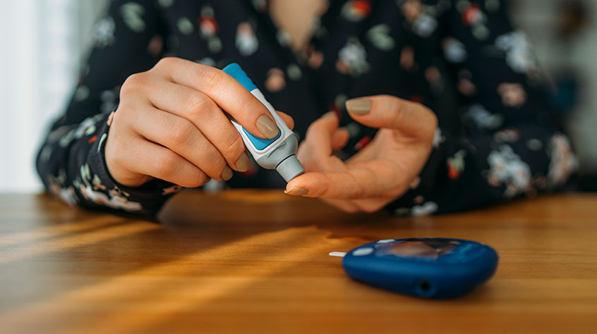close up of person treating diabetes