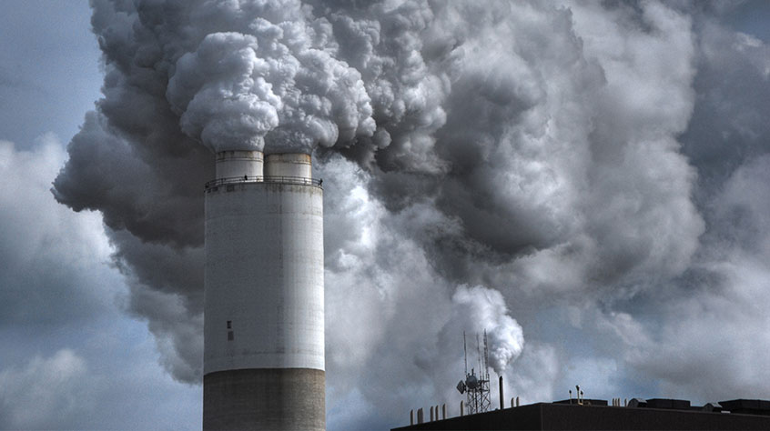 chimney emitting gases and pollution