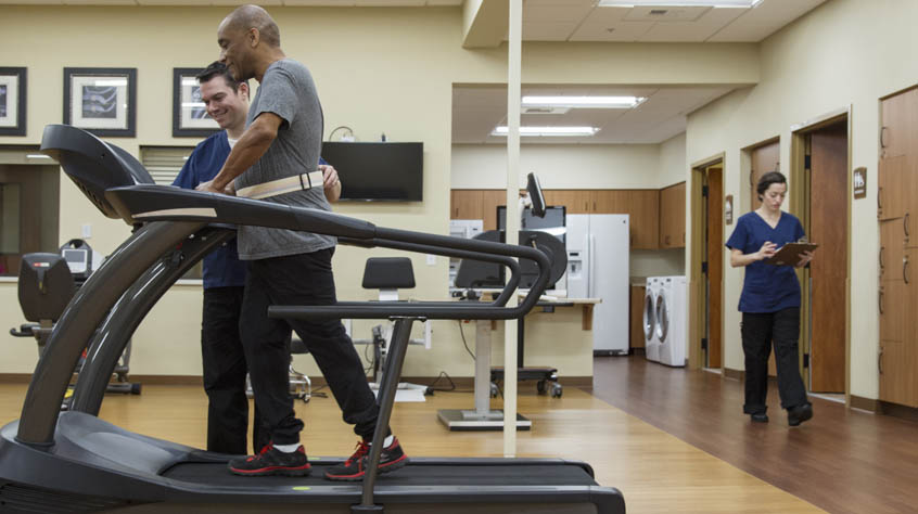 Patient having physical therapy in hospital