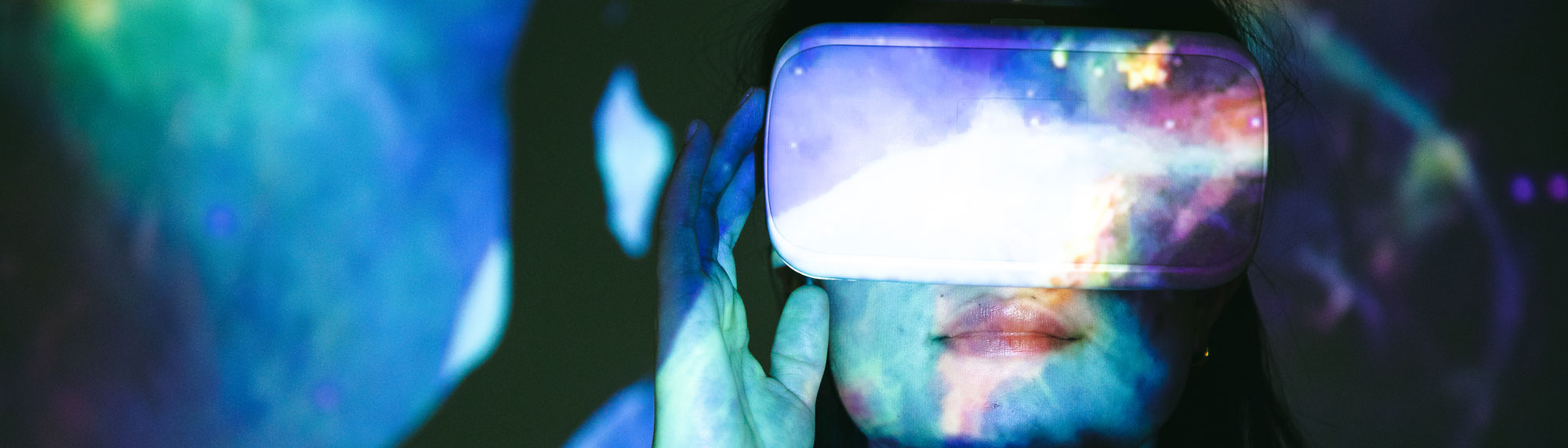 Woman wearing a Virtual Reality headset