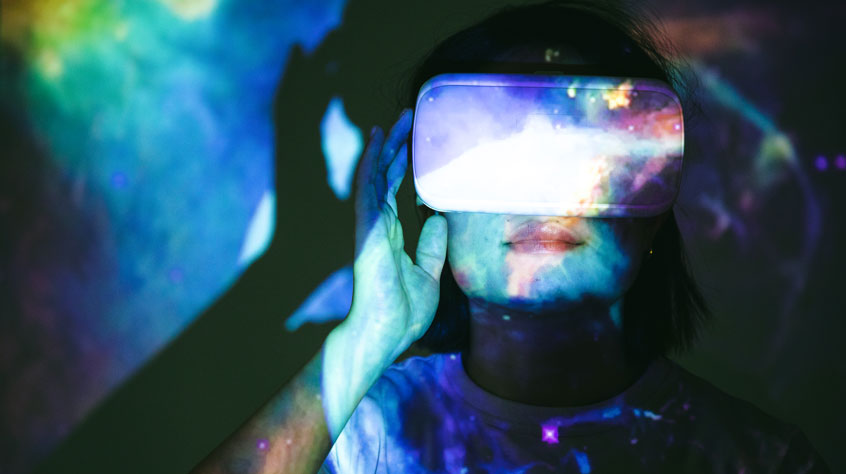 Woman wearing a Virtual Reality headset