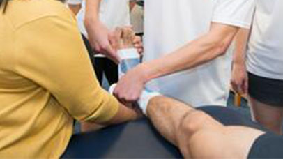 physio therapy students assess a patients ankle