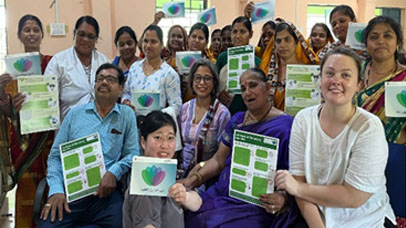 Group of people attending a workshop with Professor Nibedita  Ray-Bennett in the centre