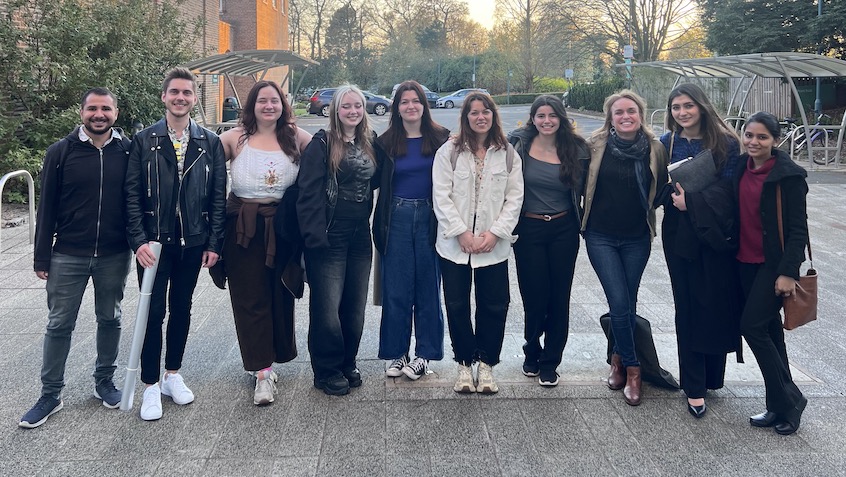 row of 10 people who form the Markaki lab