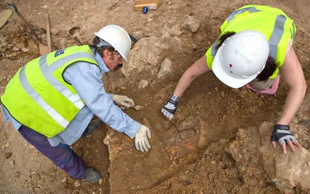 Two people on the Richard III dig site