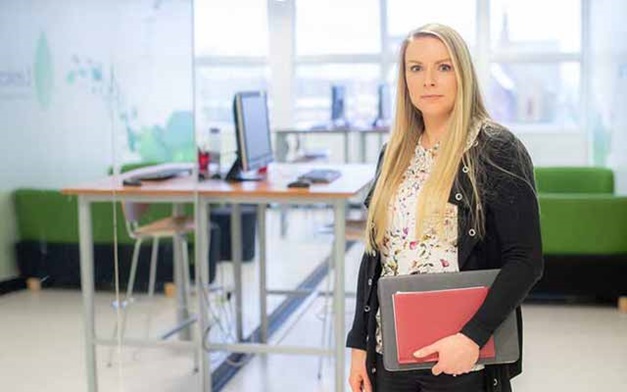 Charlotte Edwardson stood near a standing desk.