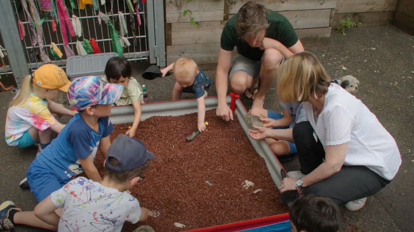 Children digging in a sandpit