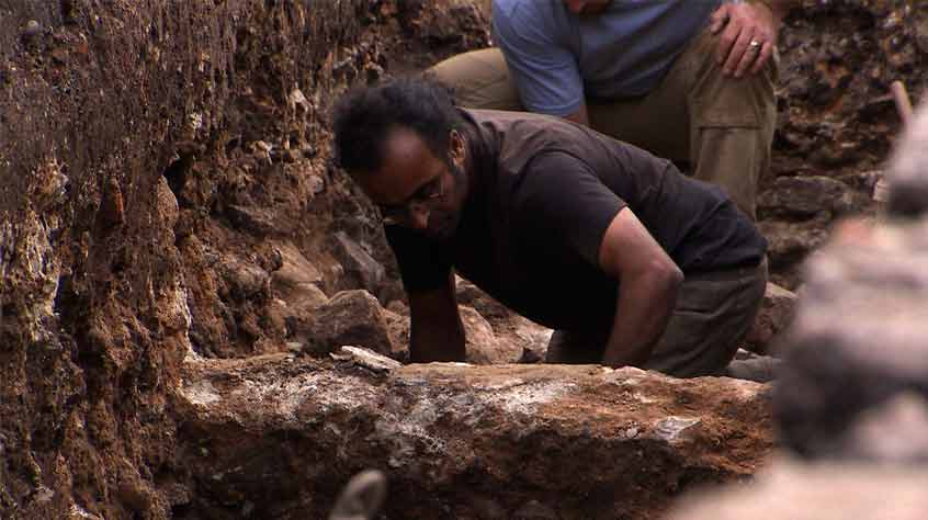 Archaeologist Anthony Gnanaratnam excavated a low stone wall in Trench 1.