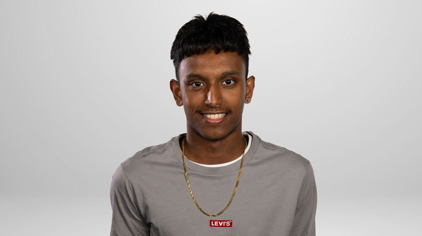 Student Jineth posing for a photo in a studio