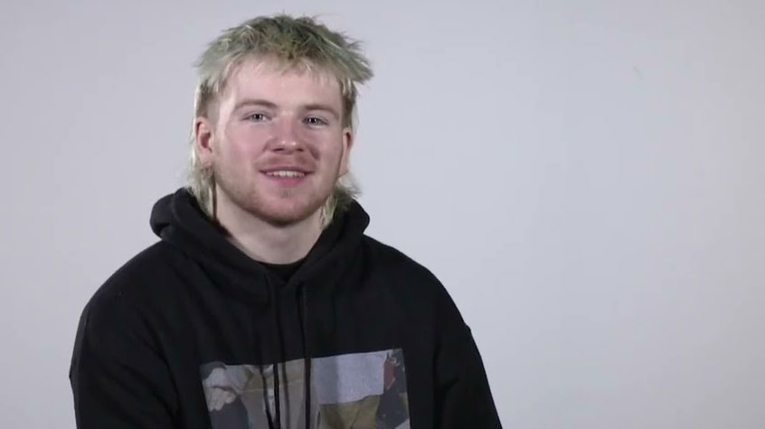 Jude looking happy as he sits down for his second interview