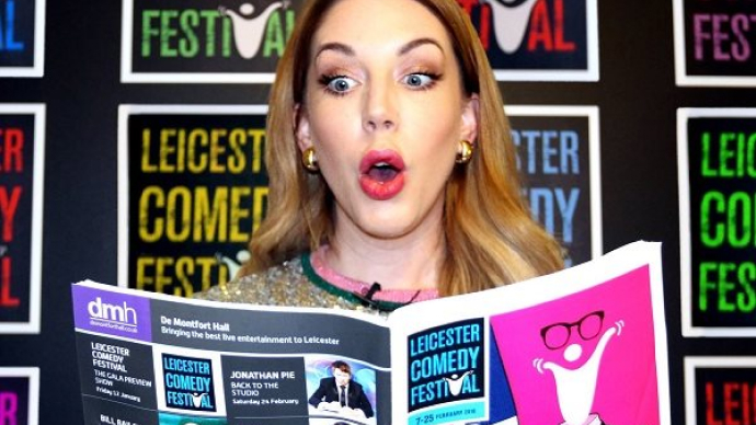 Katherine Ryan reading the Leicester comedy festival guide
