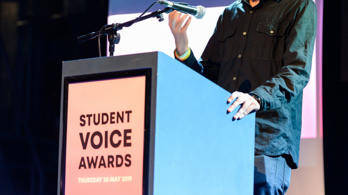 Person talking at a podium for the Student Voice Awards