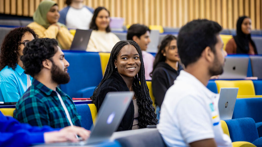 Students sitting in a lecture theatre