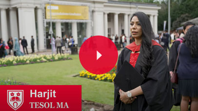 Student talking to camera at graduation