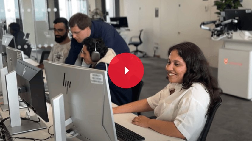 Bhumi on the computers in the lab