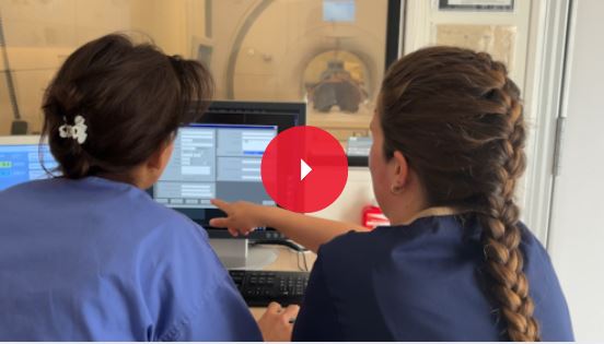 Mafalda assisting a student on the Hospital Computers