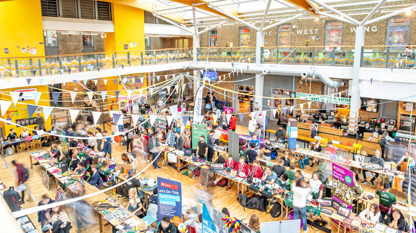 Bird's eye view of the Leicester Students' Union during a fair.
