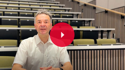 Heiko Baltzer speaking to camera in a lecture theatre.
