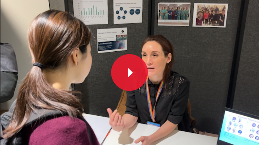 Female surgeon speaking to a medicine student at the Medicine Careers Fair