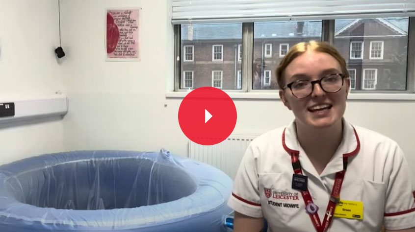 Midwifery student in uniform looking at the camera