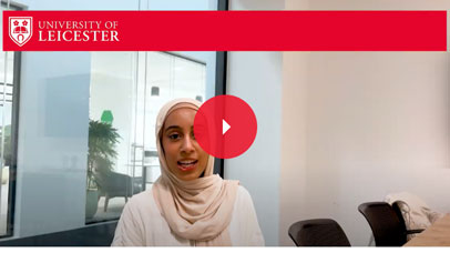 Student sitting in a classroom and being interviewed