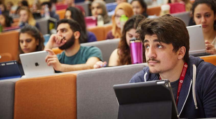 Student listening intently during a lecture