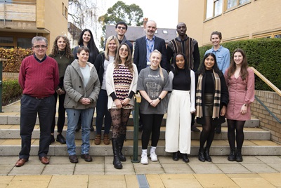 WTDTP students standing together with career coach and programme director