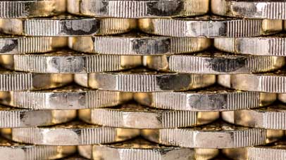 Pound coins stacked on each other
