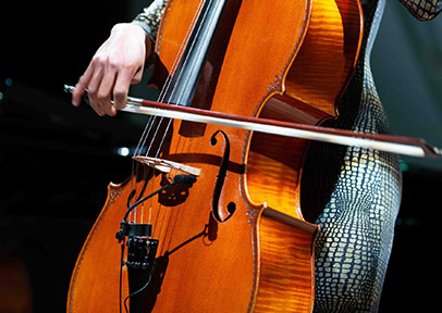 Cello player cellist hands playing violon cello