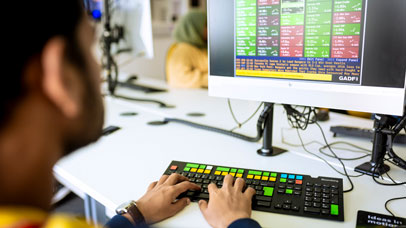 Student using a Bloomberg terminal.