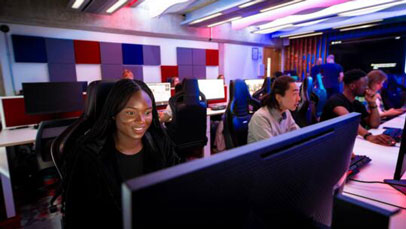 Students sitting in a computer lab in the David Wilson Library.