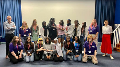 Students posing for a picture at a summer school event