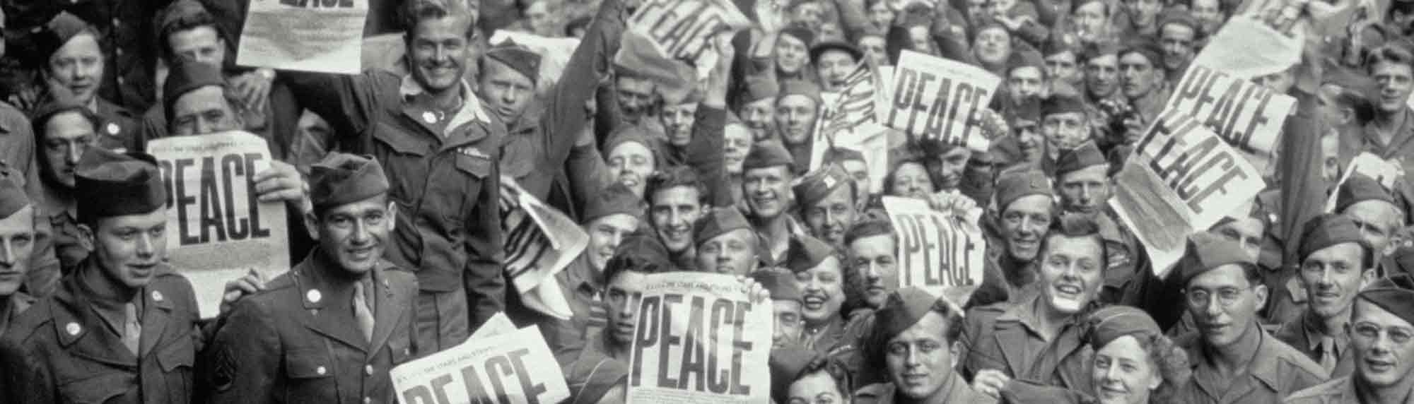 Soldiers holding peace signs in the 1940s