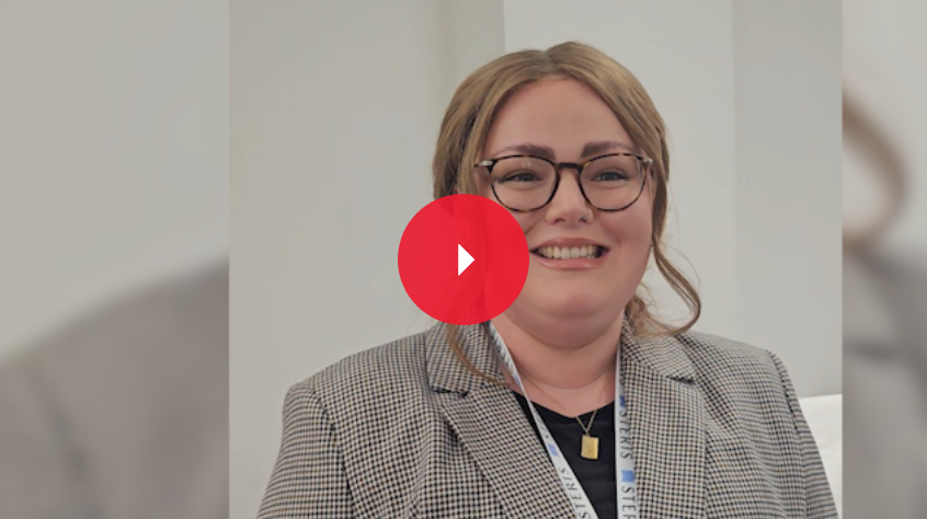 Smartly dressed ODP student smiling facing the camera during interview