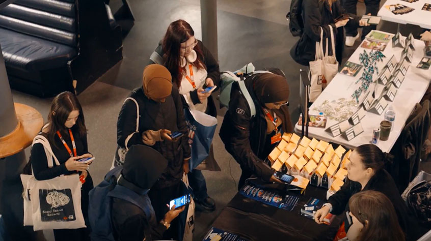 Birds eye view of students socialising at an event.