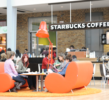 Students sitting on sofas in the Students' Union