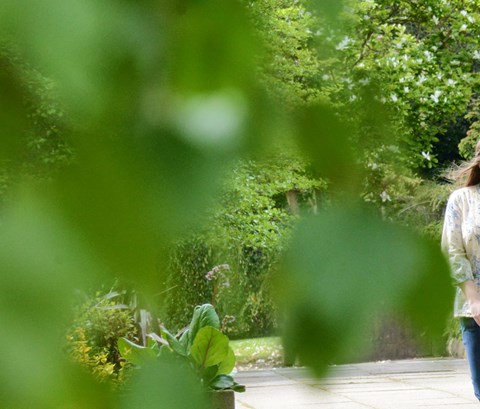 Students walking through University of Leicester campus.